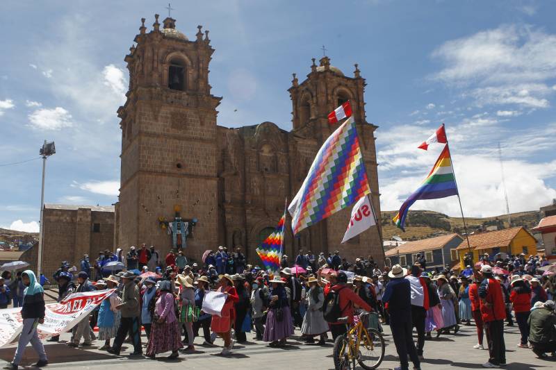 Supporters of former Peruvian President Pedro Castillo hold a demonstration demanding his release in Puno, Peru. AFP