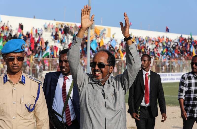 Somalia's President Hassan Sheikh Mohamud (C) gestures as he attends a rally against the Al-Shabaab jihadist group in Mogadishu. AFP