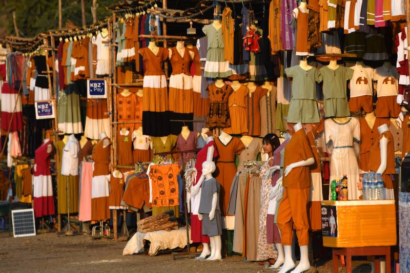 A vendor waiting for customers during the Mann Shwe Sat Thaw Pagoda Festival at Min Bu township in Magway Region. AFP