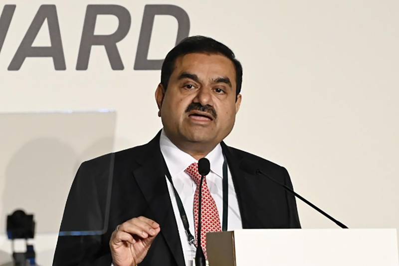 Shares in India's Adani plunge 15% after fraud claims