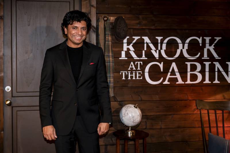 US filmmaker M. Night Shyamalan poses during a photocall for his movie 