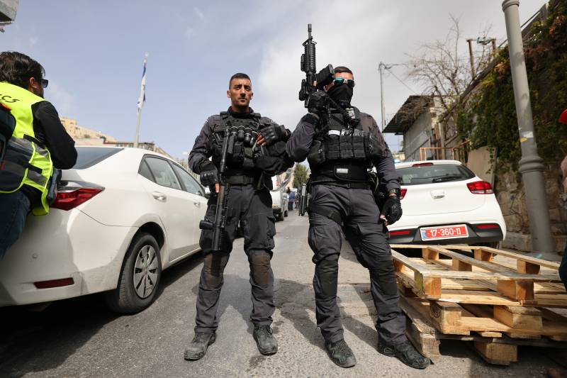 Israeli security forces stand guard in Jerusalem's predominantly Arab neighbourhood of Silwan, where an assailant reportedly shot and wounded two people. AFP