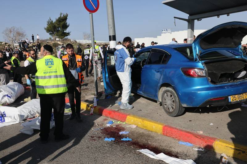 Israeli emergency responders gather at the site of a reported ramming attack in Jerusalem. AFP