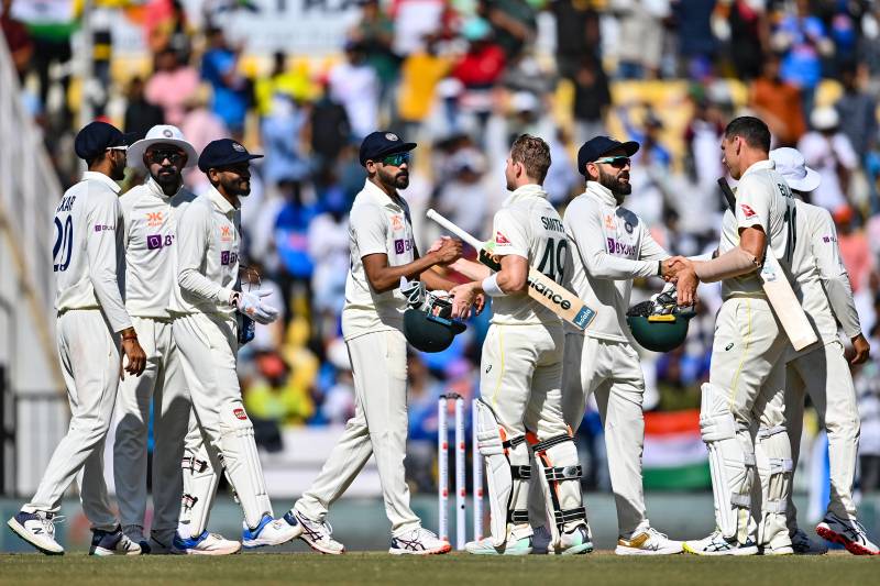 India's players shake hands with Australia's cricketers after India's win in the third day of the first Test cricket match between India and Australia at the Vidarbha Cricket Association (VCA) Stadium in Nagpur. AFP