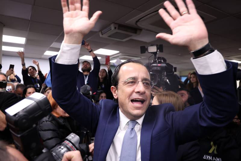 In this file photo taken on February 06, 2023 Former Cypriot foreign minister and presidential candidate Nikos Christodoulides, gestures to his supporters following the results of the exit poles of the first round of presidential elections, in his office in the capital Nicosia, on February 5, 2023. AFP 