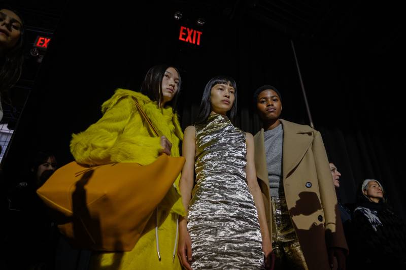 Models wearing creations by Proenza Schouler gather backstage prior to their runway show during New York Fashion Week on February 11, 2023. AFP 