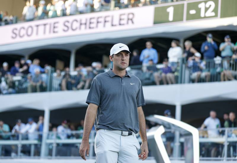 Scottie Scheffler of the United States walks off the 16th hole during the third round of the WM Phoenix Open at TPC Scottsdale on February 11, 2023 in Scottsdale, Arizona. AFP 