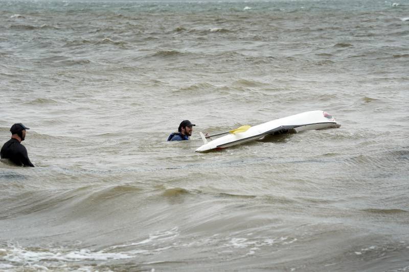 Flights grounded, power cut as storm lashes New Zealand