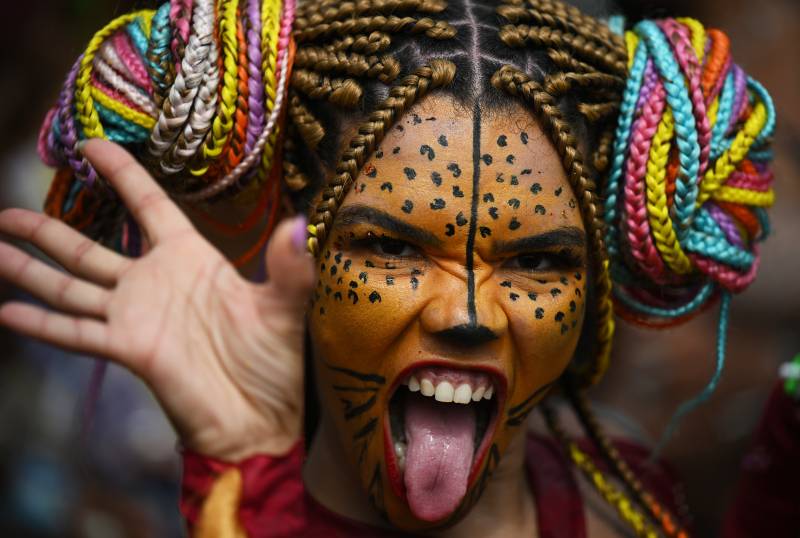 A reveller performs during a street party called “Amigos Da Onca” close to Flamengo beach in Rio de Janeiro, Brazil, on February 18, 2023. AFP 