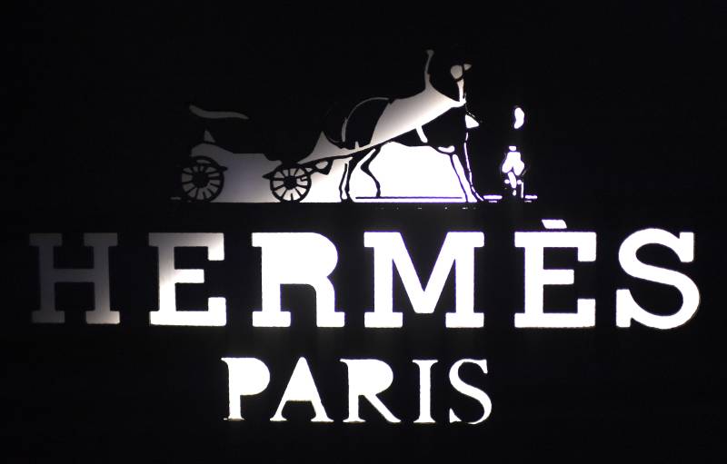 This file photograph taken on December 20, 2017, shows the logo of the French fashion house and luxury goods manufacturer Hermes, in the fashionable and luxurious street 