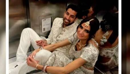 Couple stuck in elevator on big day 