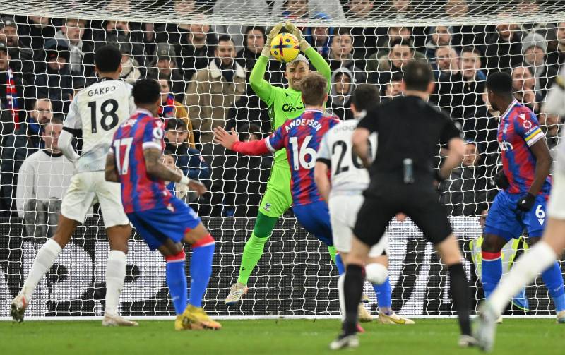 Crystal Palace's Spanish goalkeeper Vicente Guaita (C) saves a shot from Liverpool's Portuguese striker Diogo Jota during the English Premier League football match between Crystal Palace and Liverpool at Selhurst Park in south London on Saturday. AFP 