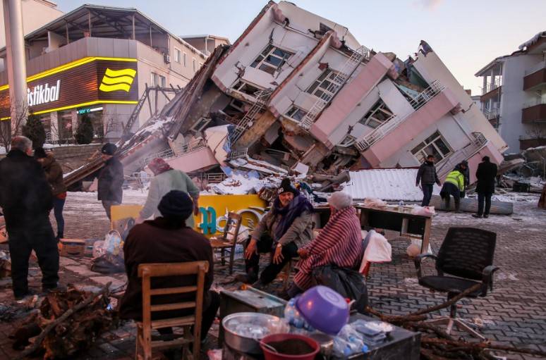 Damaged buildings collapse after fresh quake in Turkey