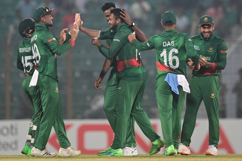 Bangladesh's players celebrate after the dismissal of England's Rehan Ahmed during the third ODI between Bangladesh and England at the Zahur Ahmed Chowdhury Stadium. AFP