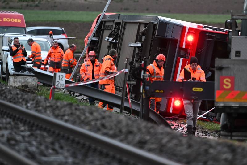 15 hurt as two Swiss trains derail in storm