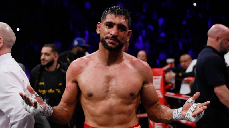 Ex-world champion Amir Khan handed two-year ban for doping