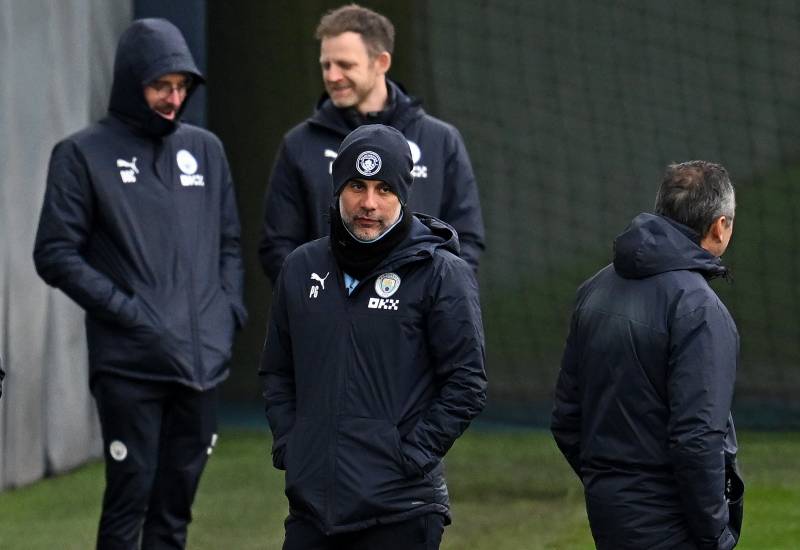 Manchester City's Spanish manager Pep Guardiola attends a team training session at Manchester City training ground in Manchester. AFP