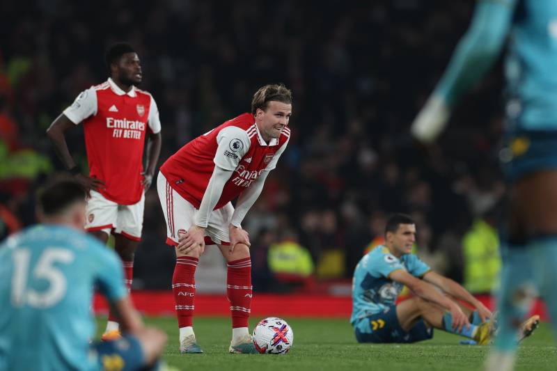 Arsenal's English defender Rob Holding (C) reacts on the pitch after the English Premier League football match between Arsenal and Southampton at the Emirates Stadium in London on April 21, 2023. The game finished 3-3. AFP 