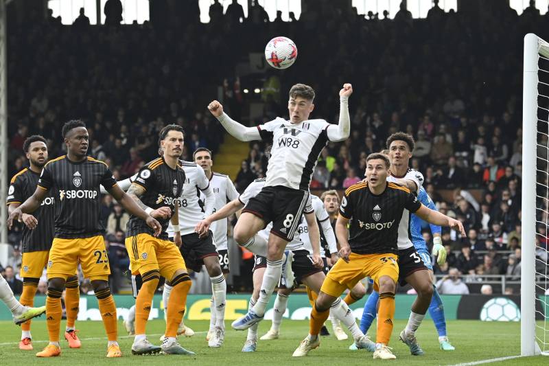 Fulham's Welsh midfielder Harry Wilson (C) defends at a corner kick during the English Premier League football match between Fulham and Leeds United at Craven Cottage in London. AFP