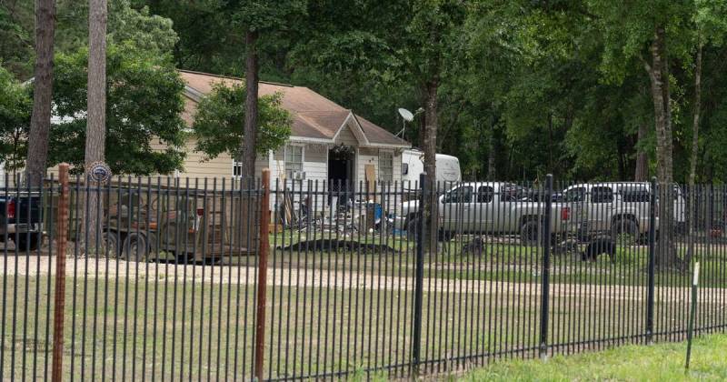 Exterior of a crime scene where five people, including an 8-year-old child, were killed after a shooting inside a home on April 29, 2023 in Cleveland, Texas. AFP