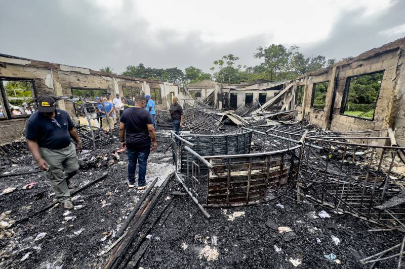 Fire that killed 19 in Guyana school dorm may have been set 'maliciously'