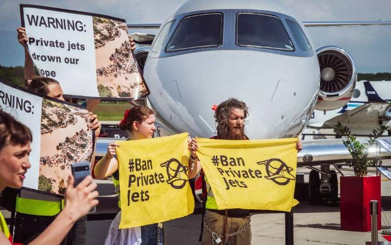 Swiss fine climate activists after flights disrupted