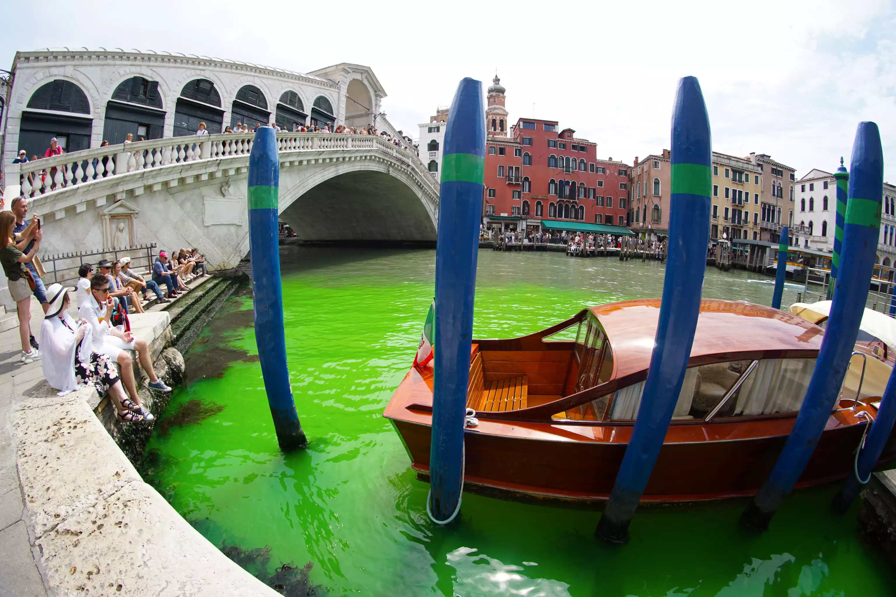 Venice's Grand Canal turns bright green due to fluorescein