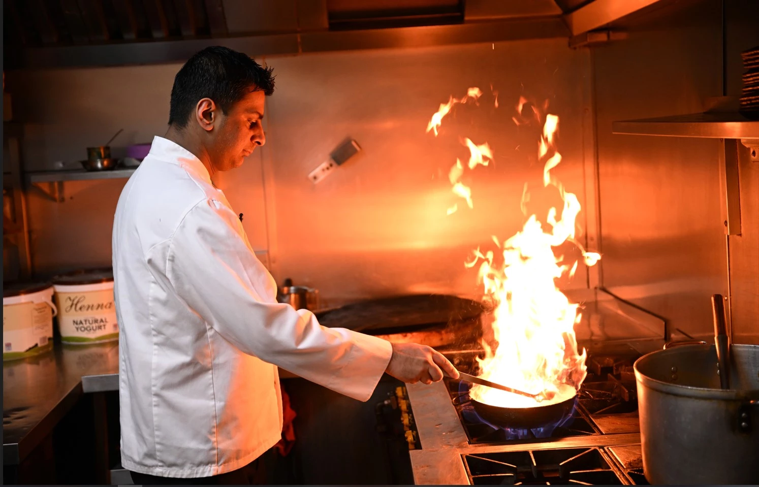 Under-threat UK balti restaurants keep calm and Pakistani curry on