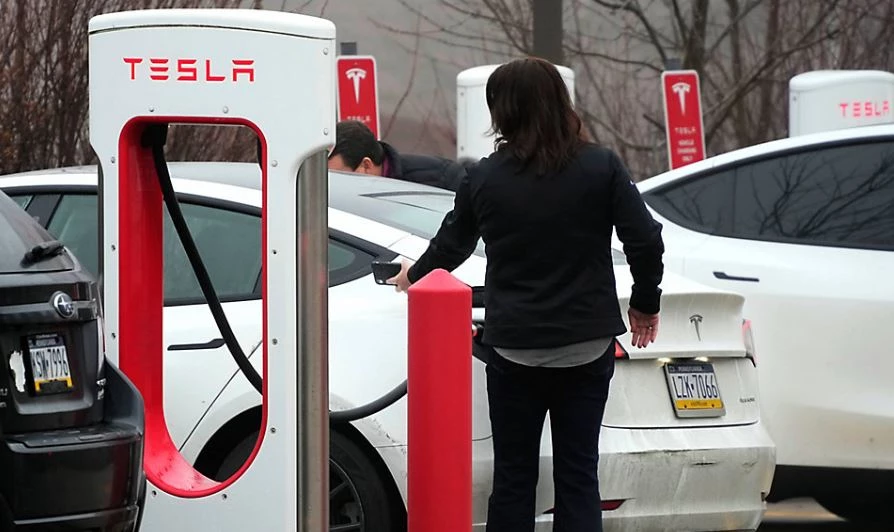 Strange bedfellows: auto rivals embrace Tesla EV chargers