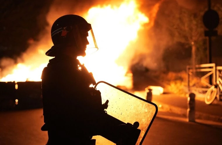 French fireman dies putting out blaze during riots