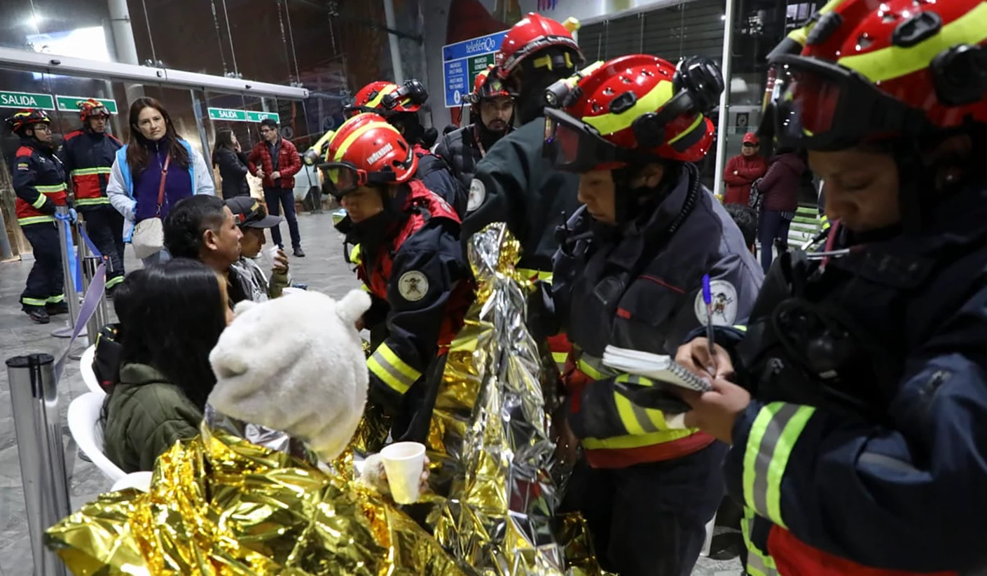 Dozens rescued  hours after being trapped on world's highest tourist cable car