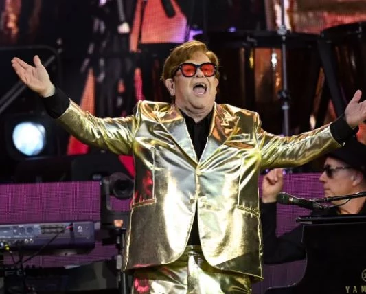 Elton John hails fans at emotional final farewell show