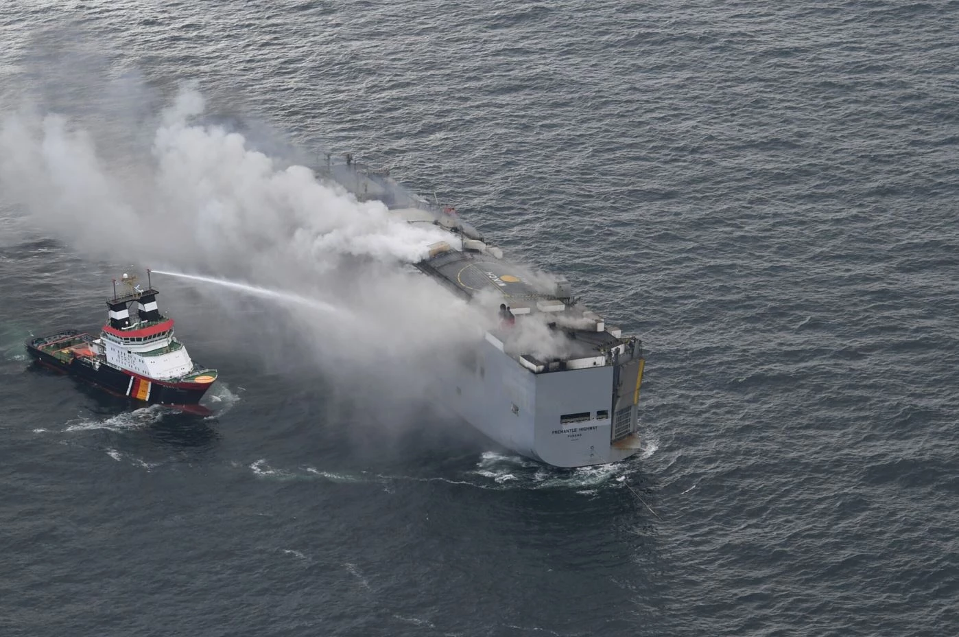 Blazing cargo ship off Netherlands to be towed, 'likely this weekend'