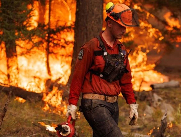 Third firefighter dies battling massive blazes in Canada