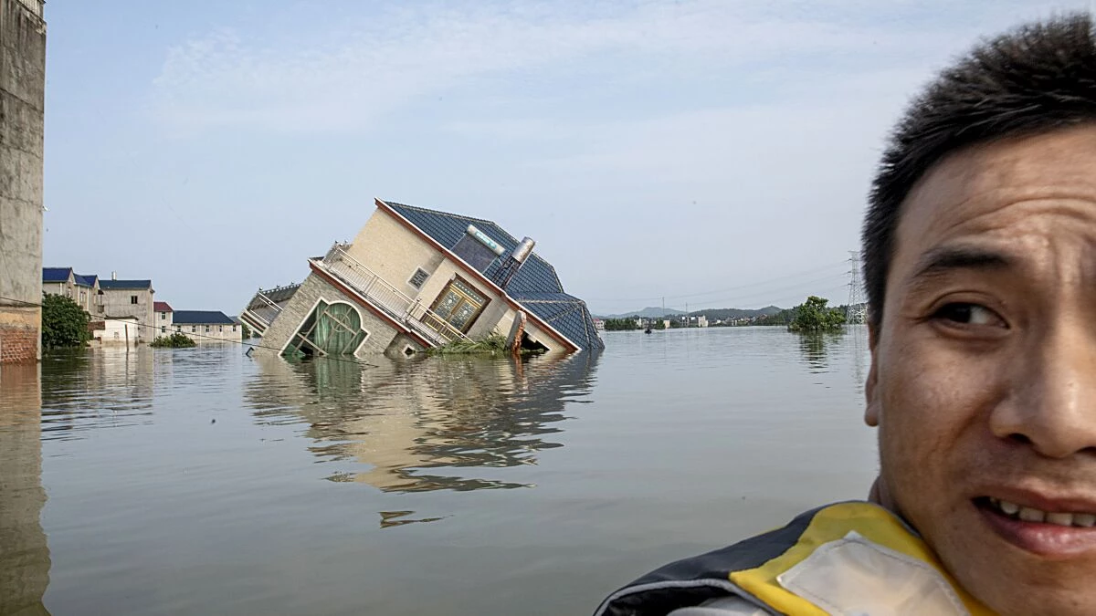 Floods for miles: swathes of China underwater after historic rain