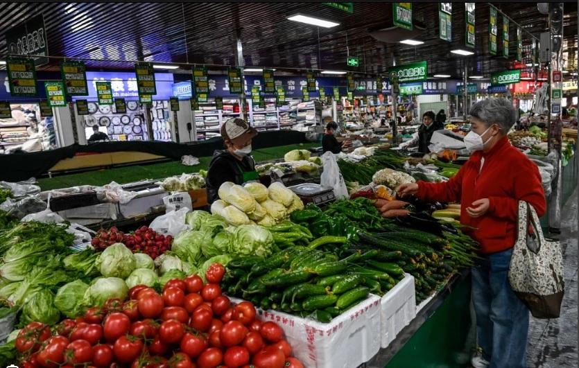 China slips into deflation as post-Covid recovery falters