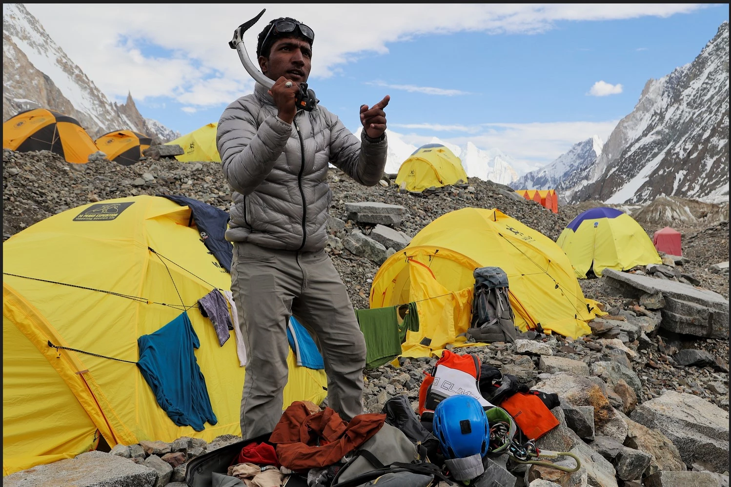 Pakistan climber cleanses K2 as shrine to fallen father