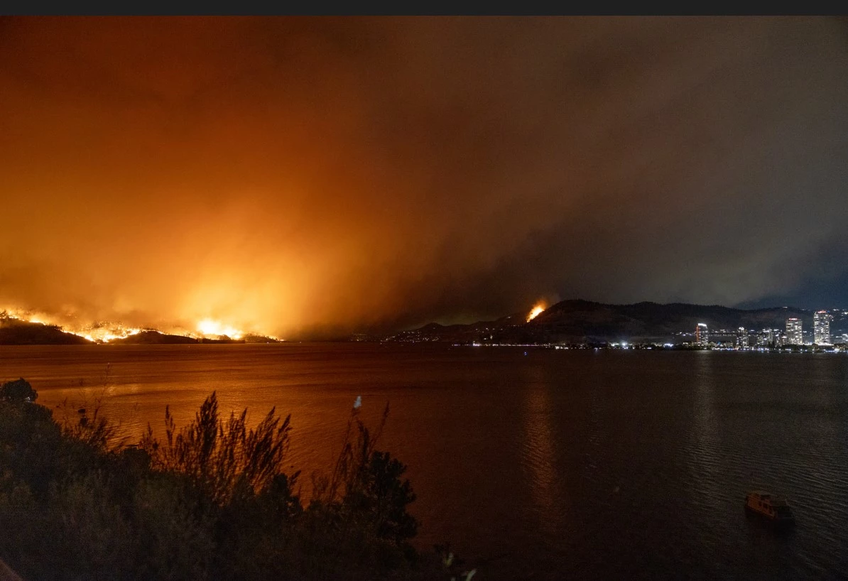 Western Canada wildfires force tens of thousands to flee