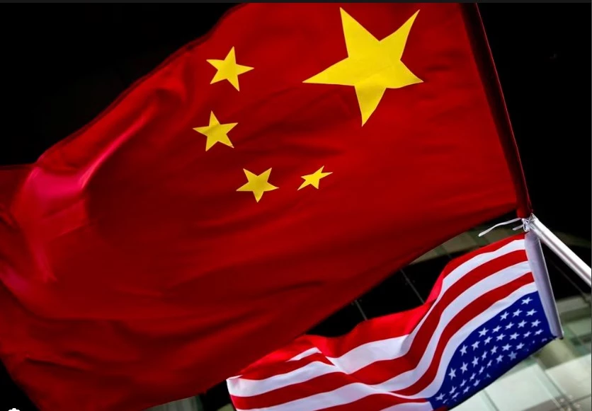 China accuses government employee of spying for US