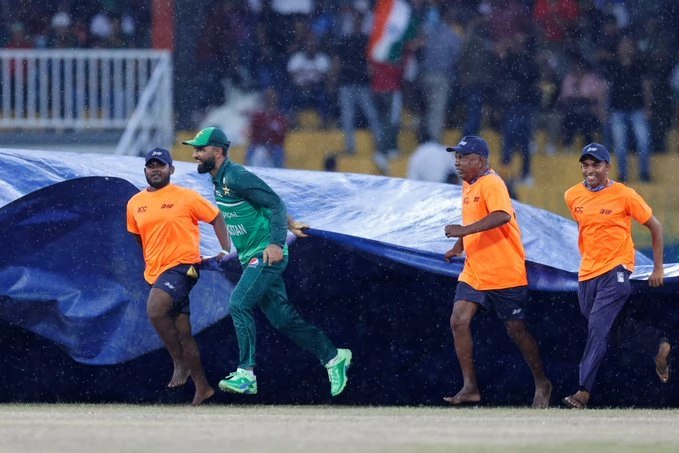 Fakhar Zaman pitches in to aid ground staff amid rain at R. Premadasa Stadium