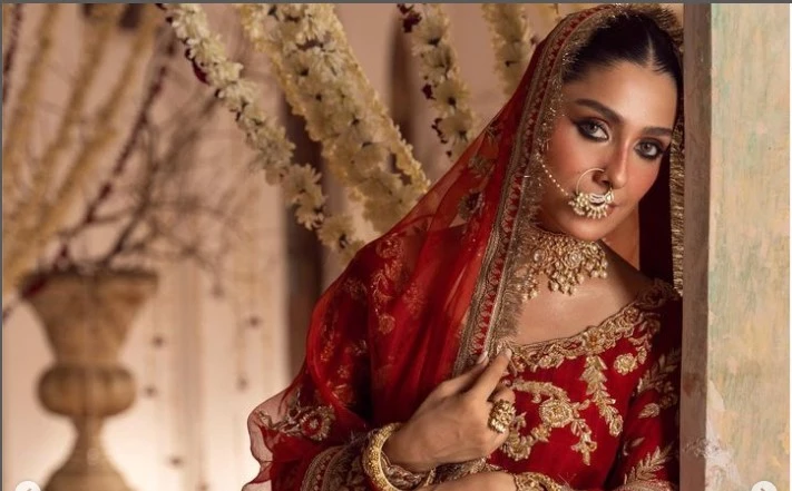 Elegance oozes from Ayeza Khan in red bridal jora