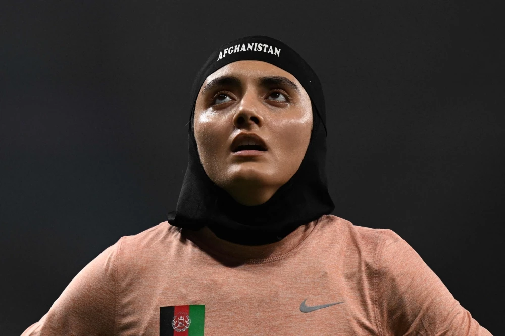 Afghan woman sprinter sends message of defiance at Asian Games