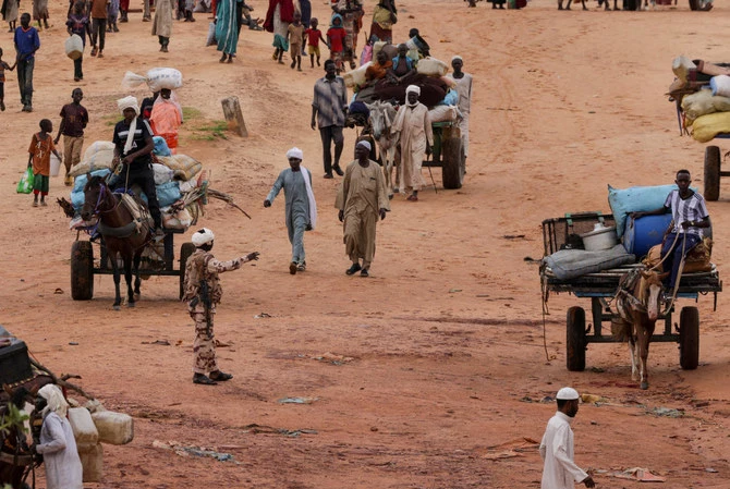 Thousands flee southern Sudan town as war spreads: witnesses