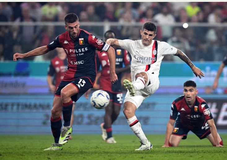 Pulisic strikes, Giroud saves as Milan move top with late drama at Genoa