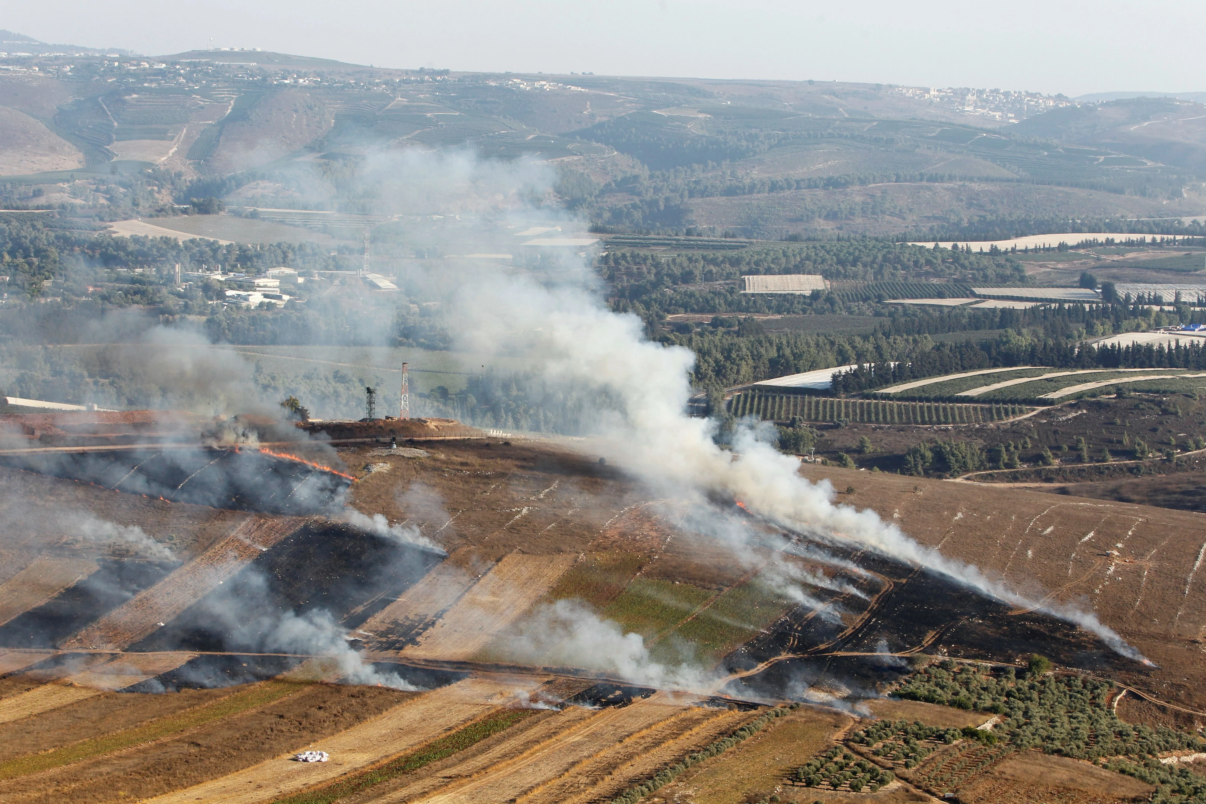 Israel shells south Lebanon as Hezbollah denies involvement