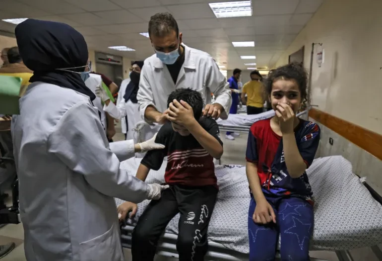 Gaza hospitals overwhelmed by air strikes and siege: doctors