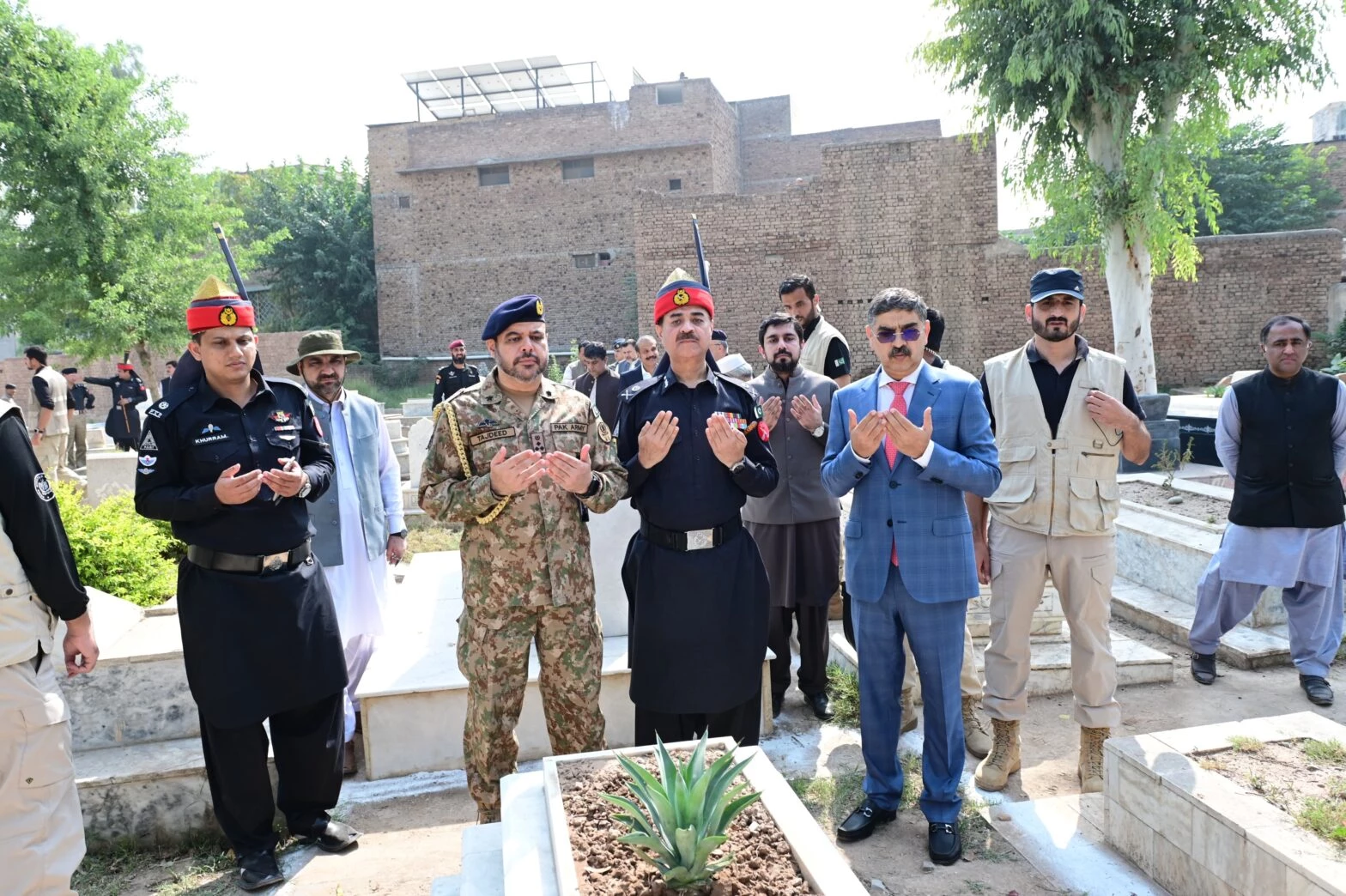 PM offers fateha at graves of former President Ghulam Ishaaq Khan, martyred Sifwat Ghayur