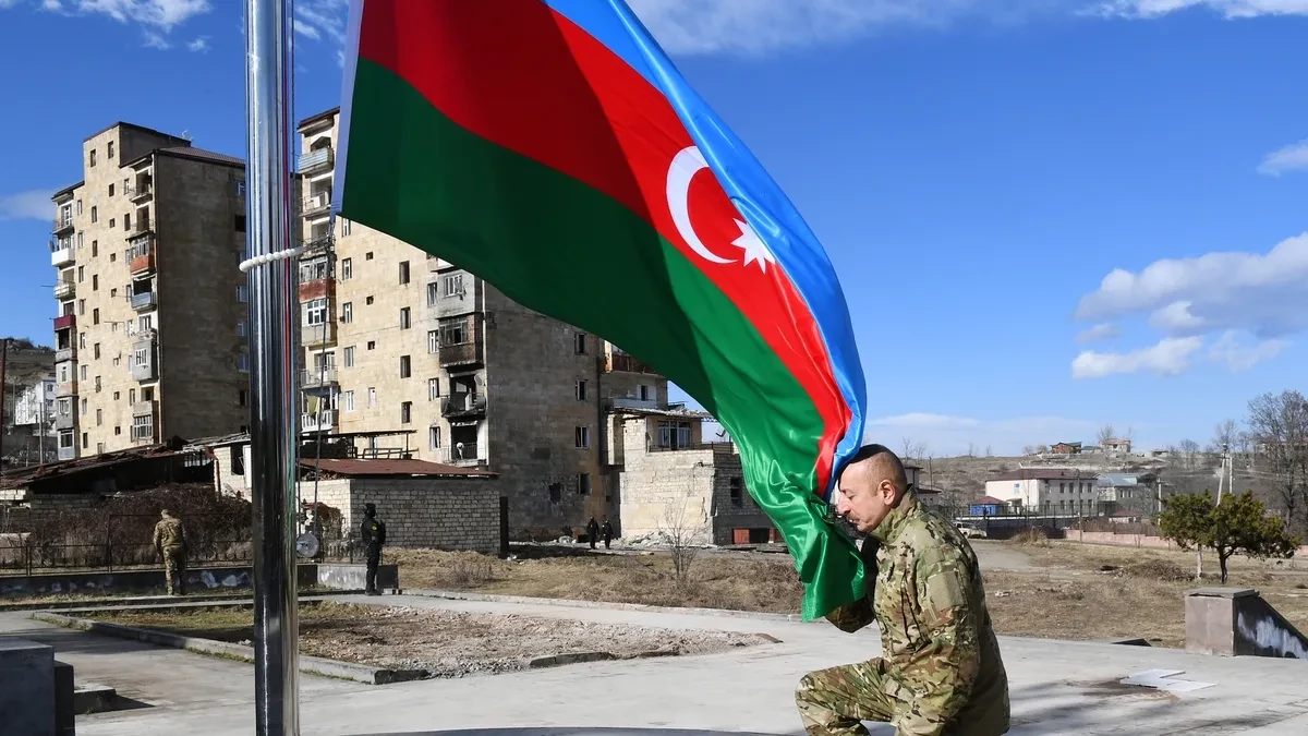 Azerbaijan leader raises national flag in Karabakh capital