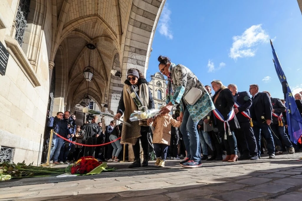 France honours teacher killed in attack