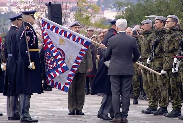 Czech president knocks soldier's hat off by striking him with flagpole